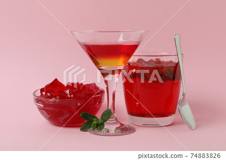 Concept of dessert with red jelly on pink background 74883826