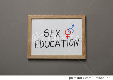 Chalkboard with text Sex Education on gray background Chalkboard with text Sex Education on gray background 74884062