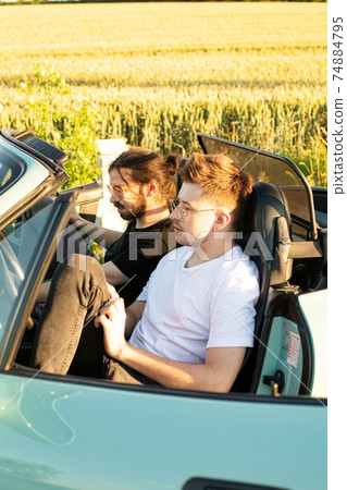 White european boys in the car 74884795