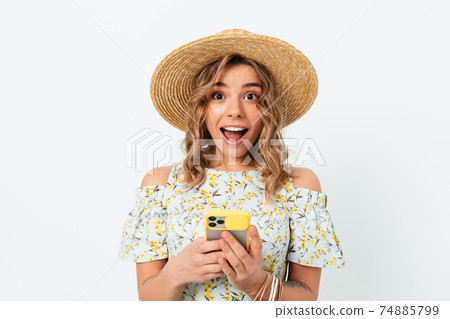 Excited young woman with paper shopping bags Excited young woman with paper shopping bags 74885799