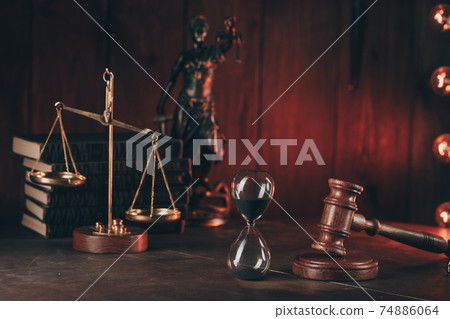 Judge's gavel, scales, lady of justice and hourglass. Law and justice concept 74886064