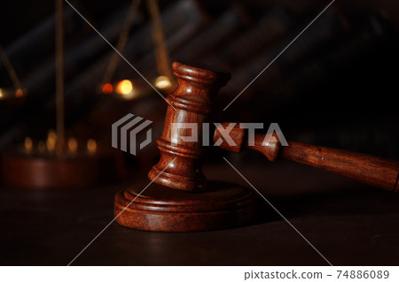 Wooden judge gavel close-up Wooden judge gavel close-up 74886089