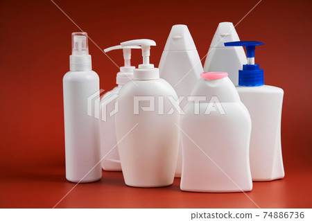 A various shapes blank white plastic bottles of soap products A various shapes blank white plastic bottles of soap products 74886736