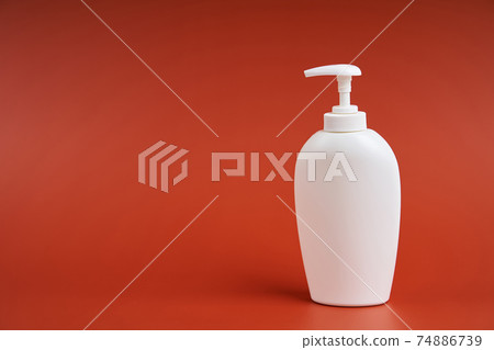 Clean white plastic bottle with soap dispenser Clean white plastic bottle with soap dispenser 74886739