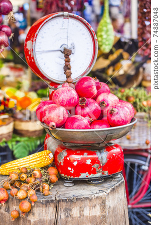 Fruit market with old scales and garnet in Campo di Fiori, Rome 74887048