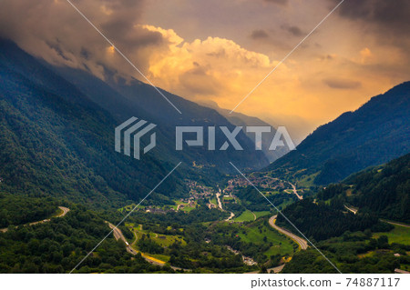 Aerial view of the San Bernardino mountain pass in the Swiss Alps, Switzerland Aerial view of the San Bernardino mountain pass in the Swiss Alps, Switzerland 74887117