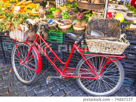 Fruit market with old bike in Campo di Fiori, Rome Fruit market with old bike in Campo di Fiori, Rome 74887137