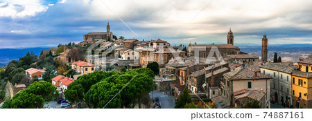 Landmarks of Italy - medieval town Montalcino over sunset. Tuscany Landmarks of Italy - medieval town Montalcino over sunset. Tuscany 74887161