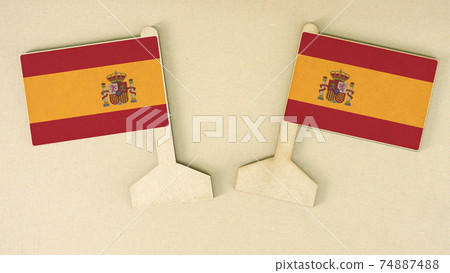 Flags of Spain made of recycled paper on the cardboard desk, flat layout Flags of Spain made of recycled paper on the cardboard desk, flat layout 74887488