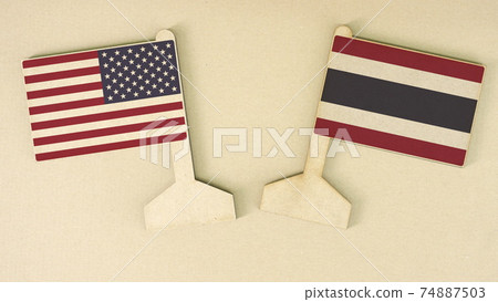 Flags of the USA and Thailand made of recycled paper on the cardboard desk, flat layout Flags of the USA and Thailand made of recycled paper on the cardboard desk, flat layout 74887503