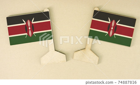 Flags of Kenya made of recycled paper on the cardboard desk, flat layout Flags of Kenya made of recycled paper on the cardboard desk, flat layout 74887816