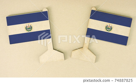 Two flags of El Salvador made of recycled paper on the cardboard desk, flat layout Two flags of El Salvador made of recycled paper on the cardboard desk, flat layout 74887825