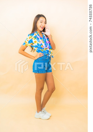 Portrait young asian woman wear colorful shirt for songkran Portrait young asian woman wear colorful shirt for songkran 74888786