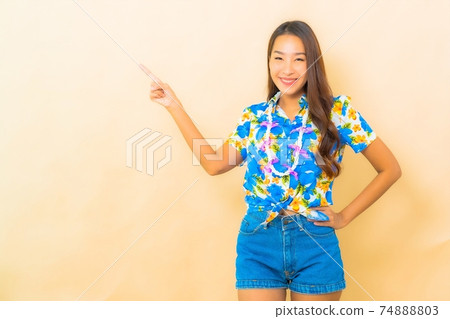Portrait young asian woman wear colorful shirt for songkran 74888803