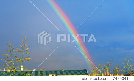 Scenery of the sky with a rainbow Scenery of the sky with a rainbow 74890413