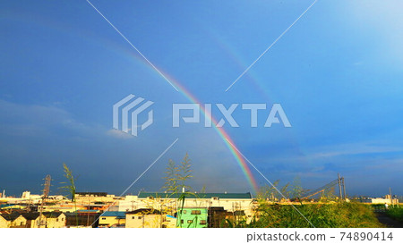 Scenery of the sky with a rainbow Scenery of the sky with a rainbow 74890414