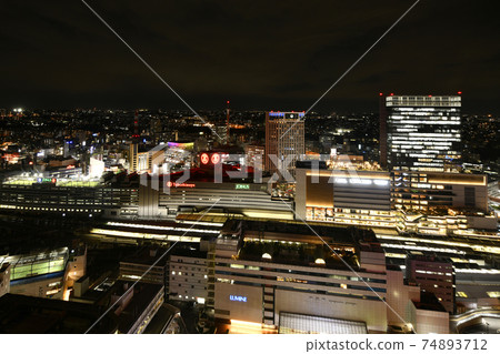 Yokohama cityscape of Japan with a panoramic view of Yokohama Station and a new attraction, JR Yokohama Tower (right of the screen) 74893712