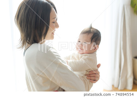 Baby hugged in Mama 74894554