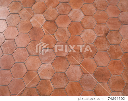 Terracotta background material. Hexagonal red brick tile. 74894602