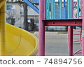 Aged and faded playground equipment 74894756