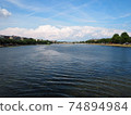 A river flowing through the city of Copenhagen, Denmark 74894984