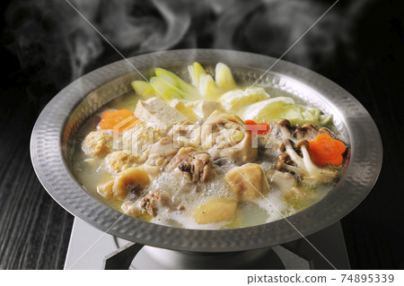 Mizutaki with lots of ingredients (black background) 74895339