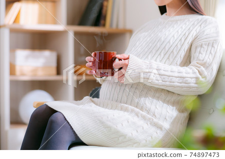 Hot drink pregnant woman 74897473