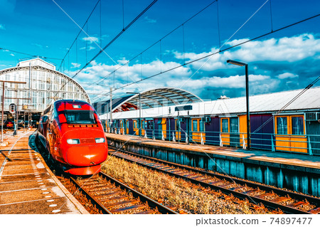 Modern Fast Passenger Train   at the station. 74897477