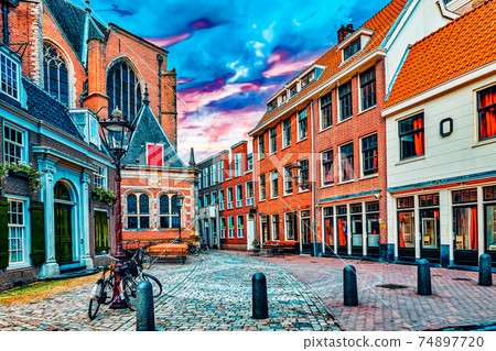 Beautiful views of the streets, ancient buildings of Amsterdam - also call "Venice in the North". Netherland Beautiful views of the streets, ancient buildings of Amsterdam - also call "Venice in the North". Netherland 74897720