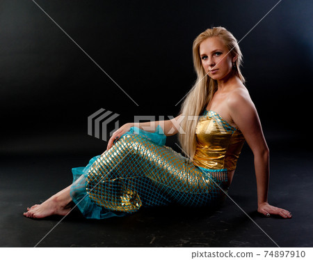 Attractive girl in mermaid costume 74897910