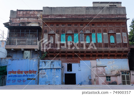 Blue white washed walls and painted doors of old house of jodhpur city, jodhpur, Rajasthan, India. Blue white washed walls and painted doors of old house of jodhpur city, jodhpur, Rajasthan, India. 74900357