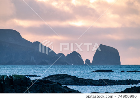The rocks at the coastline between Rosbeg and Glencolumbkille in County Donegal - Ireland. 74900990