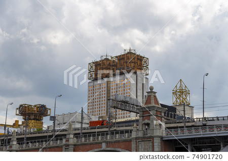 The building of the Presidium of Russian Academy of Sciences, Moscow, Russia.  Shooting from a tourist pleasure boat 74901720