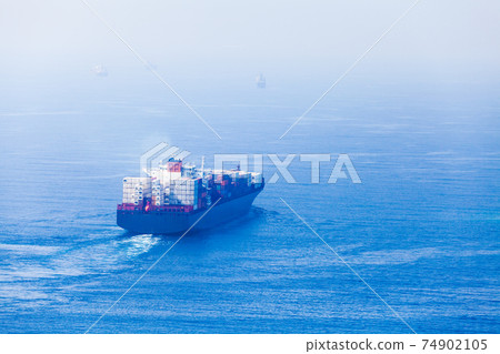 Container ship goes on Red Sea, bird eye view Container ship goes on Red Sea, bird eye view 74902105