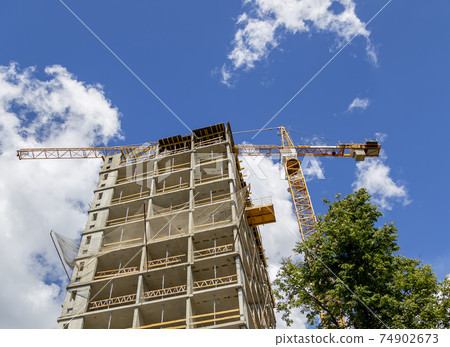 Multi-storey building under construction (new residential complex). Construction site upon renovation program in Cheryomushki district, Moscow, Russia Multi-storey building under construction (new residential complex). Construction site upon renovation program in Cheryomushki district, Moscow, Russia 74902673