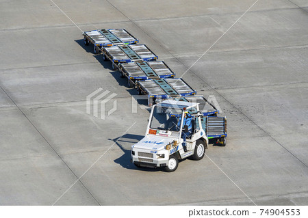 Airport scenery Towing tractor and dolly Ota-ku, Tokyo Airport scenery Towing tractor and dolly Ota-ku, Tokyo 74904553