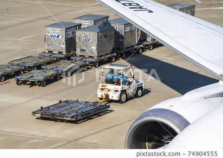 Airport scenery Towing tractor and dolly Ota-ku, Tokyo 74904555