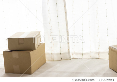 Cardboard boxes piled up in the room. Moving image 74906664