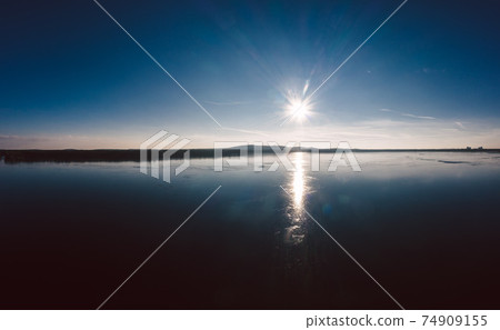 beautiful sunny winter day on the frozen Berlin Muggelsee 74909155