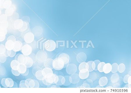 Light blue and white holiday bokeh abstract Christmas background Light blue and white holiday bokeh abstract Christmas background 74910396