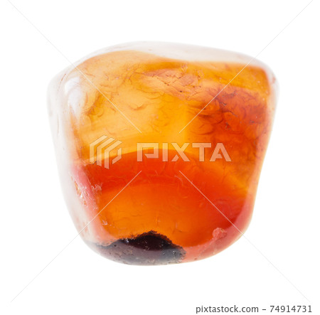 tumbled carnelian (cornelian) gemstone on white tumbled carnelian (cornelian) gemstone on white 74914731