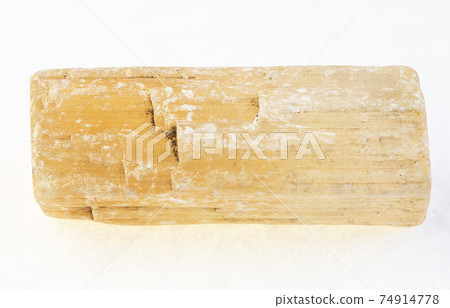 raw gypsum ( selenite ) stone on white 74914778