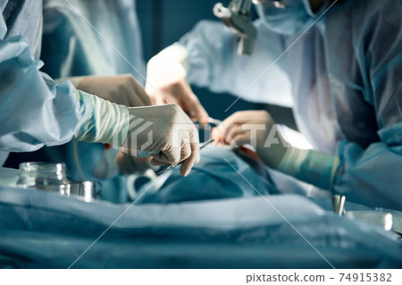 A team of surgeons is fighting for life, for a real operation, for real emotions. The intensive care team is fighting for the life of the patient. Saving life, the struggle for life 74915382