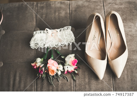 Wonderful luxury wedding bouquet of different flowers Wonderful luxury wedding bouquet of different flowers 74917387