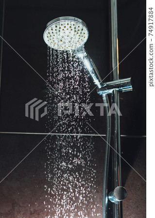 shower with flowing water shower with flowing water 74917884