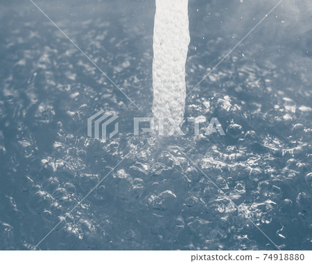 water stream with bubbles, closeup view water stream with bubbles, closeup view 74918880