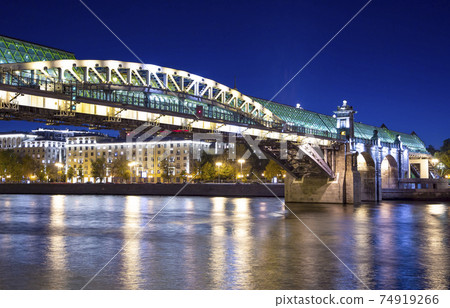 View of the Pushkinsky (Andreevsky) Bridge and Moskva River (at night). Moscow, Russia 74919266