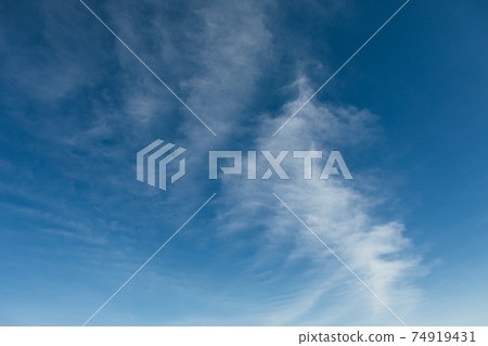 clouds on blue sky at sunny day clouds on blue sky at sunny day 74919431