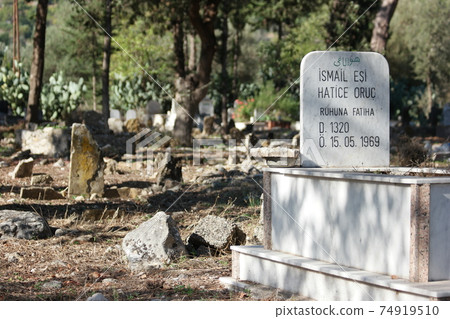 Gravestone in the muslim cemetery in Antalya, Turkey. Gravestone in the muslim cemetery in Antalya, Turkey. 74919510