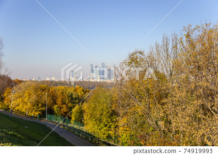 View of the city and the complex of skyscrapers Moscow city from Sparrow Hills or Vorobyovy Gory observation (viewing) platform-- is on a steep bank 85 m above the Moskva river, or 200 m above sea 74919993